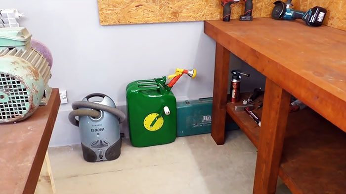 DIY case for a watering hose from an old canister