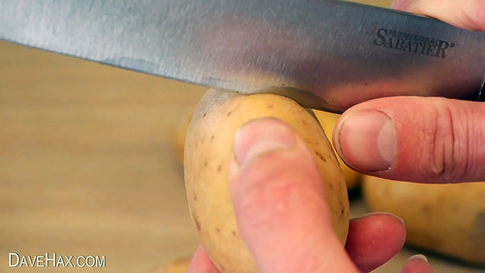 A way to quickly peel potatoes so that the skin peels off on its own