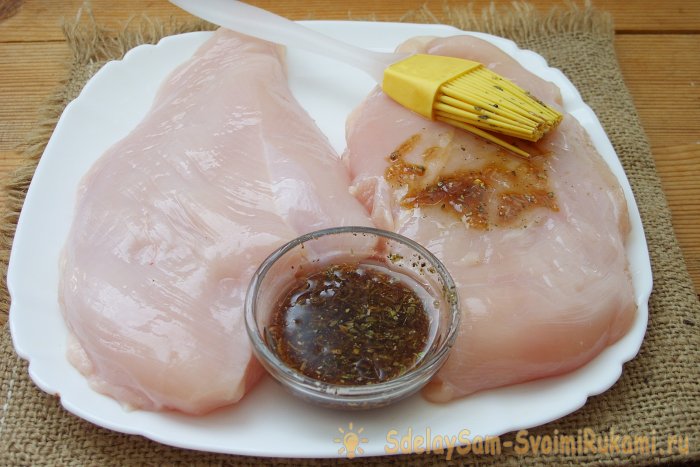 Juicy chicken fillet in a frying pan