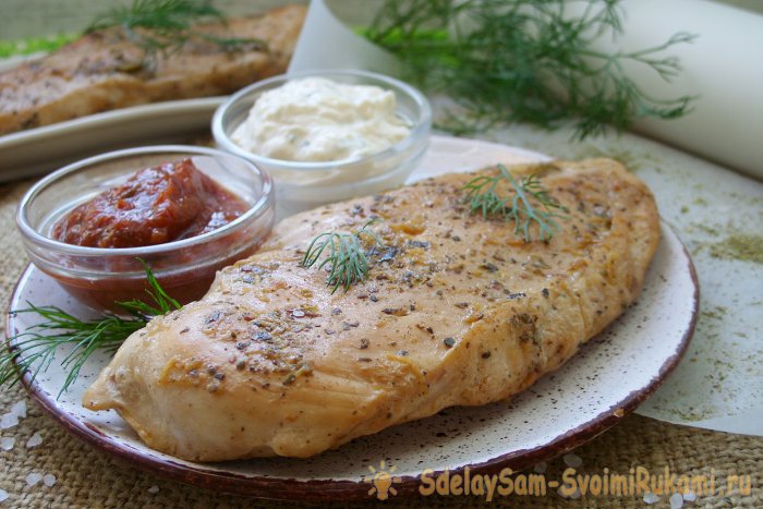 Juicy chicken fillet in a frying pan