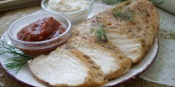 Juicy chicken fillet in a frying pan