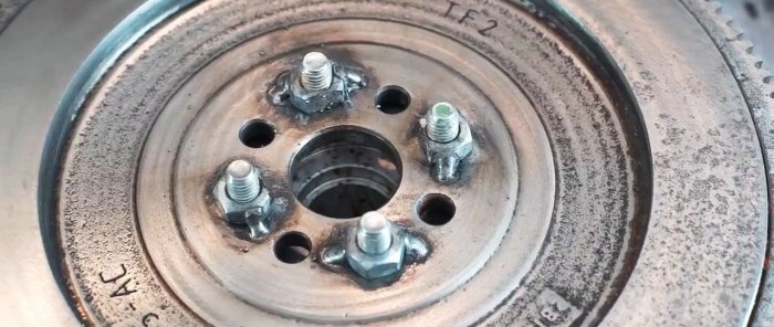 How to make a pipe bender from a car flywheel and a Bendix starter