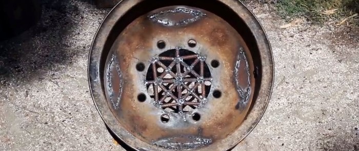 How to make a fire pit from an old wheel rim