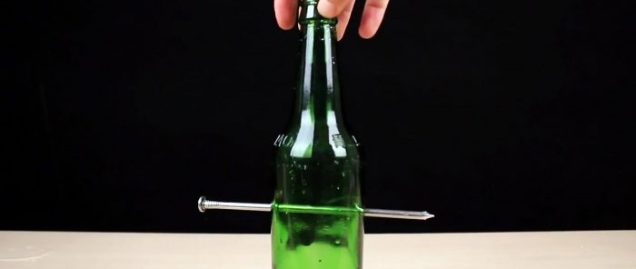 How to pierce a glass bottle with a nail