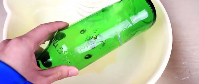 How to pierce a glass bottle with a nail