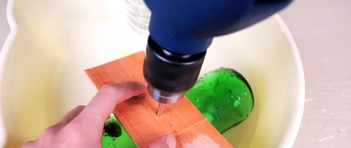 How to pierce a glass bottle with a nail