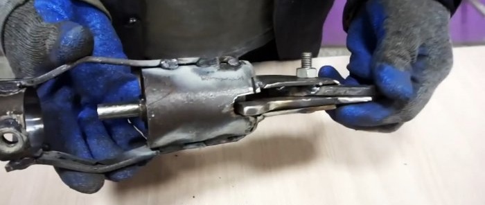 Homemade drill attachment for quick cutting of sheet metal