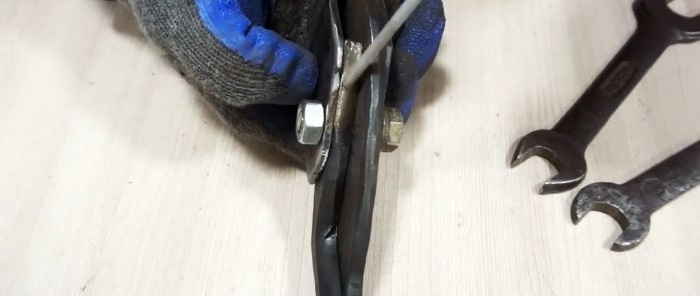 Homemade drill attachment for quick cutting of sheet metal