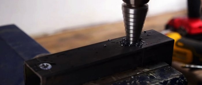 How to make a cutting machine from an angle grinder and old shock absorbers