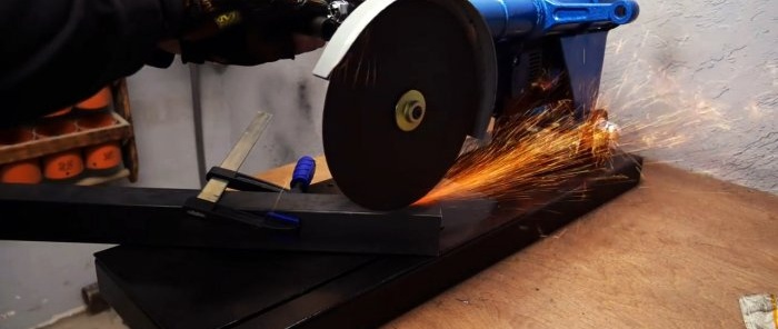 How to make a cutting machine from an angle grinder and old shock absorbers