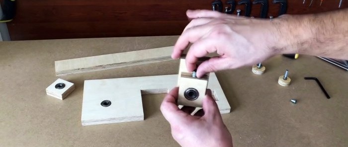 Homemade hand-held plywood band saw driven by a screwdriver