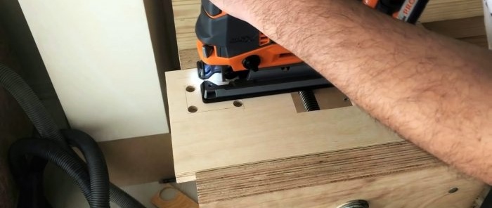 Homemade hand-held plywood band saw driven by a screwdriver