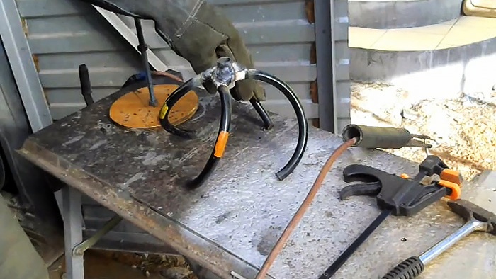 How to make a hand cultivator from a car spring