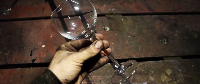 How to wrap a nail around the stem of a glass