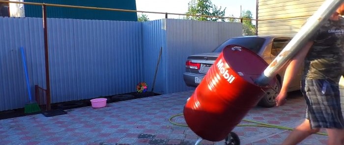 Making a mobile stove out of a barrel for burning garden waste