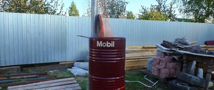 Making a mobile stove out of a barrel for burning garden waste