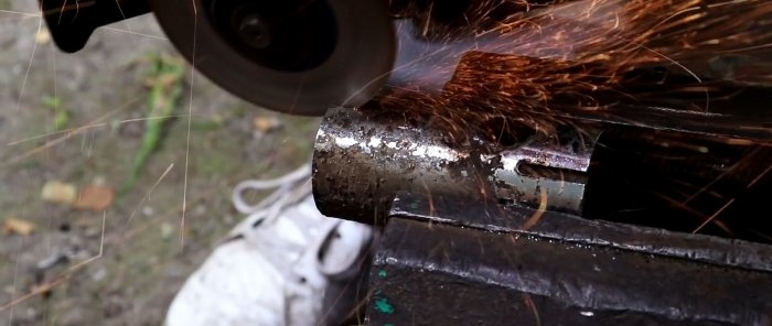 Drill attachment made from an old grinder for sawing wood