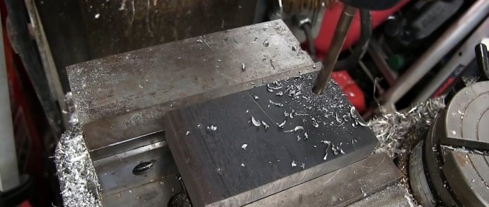 How to make a triangular hole in thick steel