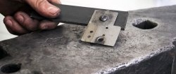 How to make a tool for installing forged rivets from a shock absorber spring and bearing