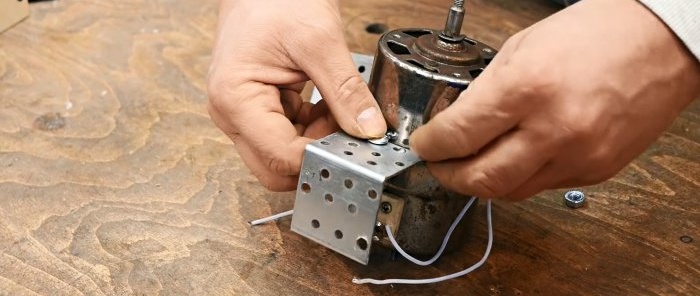 How to make a useful machine for shape cutting of metal from an old low-power motor