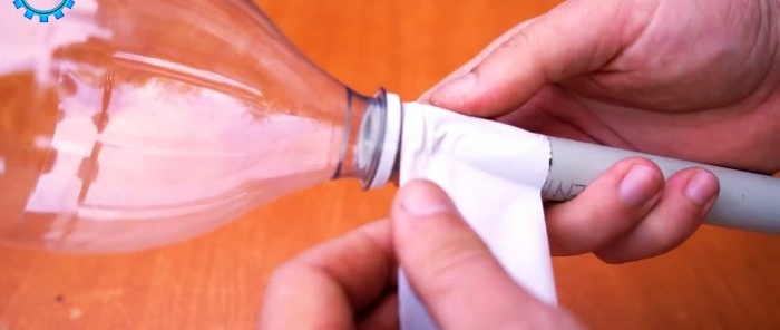 The neck of a PET bottle is wound onto the second edge.