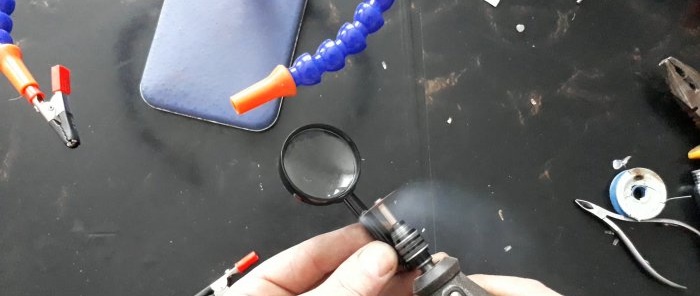 How to inexpensively assemble a third hand holder with a magnifying glass, light and fan