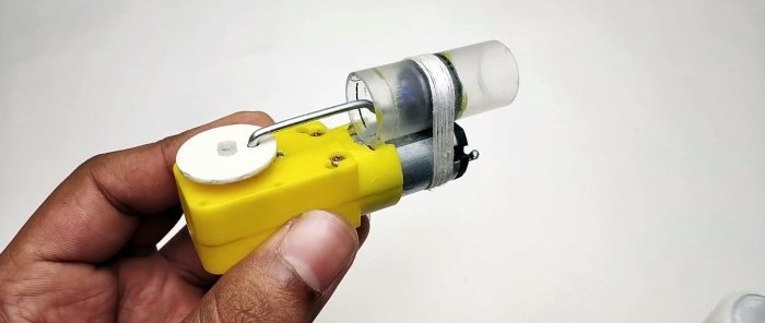 How to make a miniature compressor from a syringe and a machine gearbox