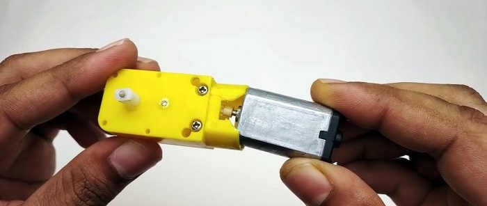 How to make a miniature compressor from a syringe and a machine gearbox