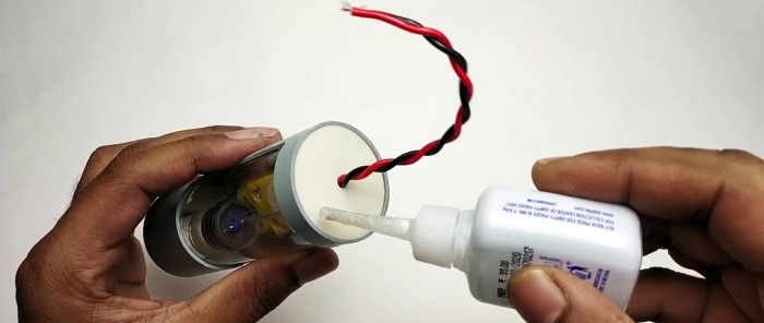 How to make a miniature compressor from a syringe and a machine gearbox