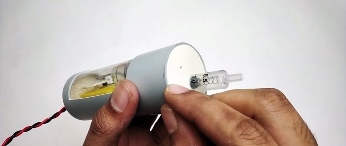 How to make a miniature compressor from a syringe and a machine gearbox