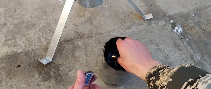 A simple stove being tested for a greenhouse or tent