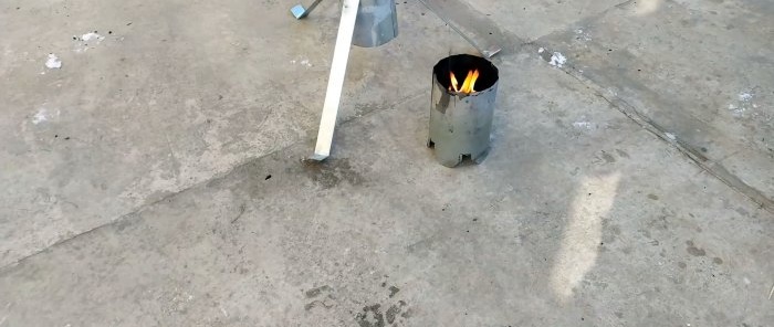 A simple stove being tested for a greenhouse or tent