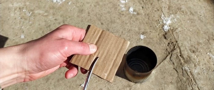 A simple stove being tested for a greenhouse or tent