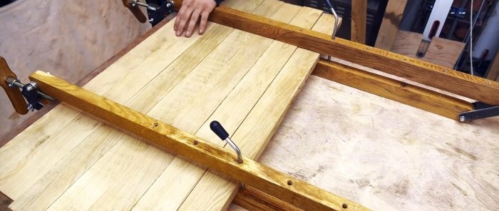 How to make clamps for gluing furniture panels from a pair of boards