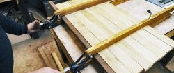 How to make clamps for gluing furniture panels from a pair of boards