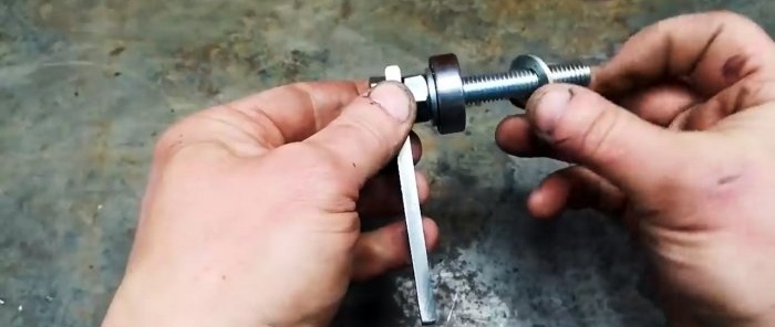 How to make a belt grinder from a grinder with your own hands