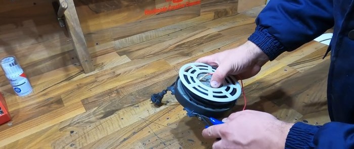 How to make a self-winding extension cord from an old vacuum cleaner