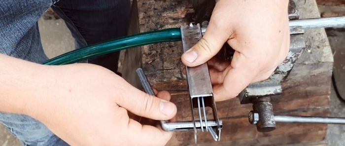 Convenient clamp made from profile pipe trim