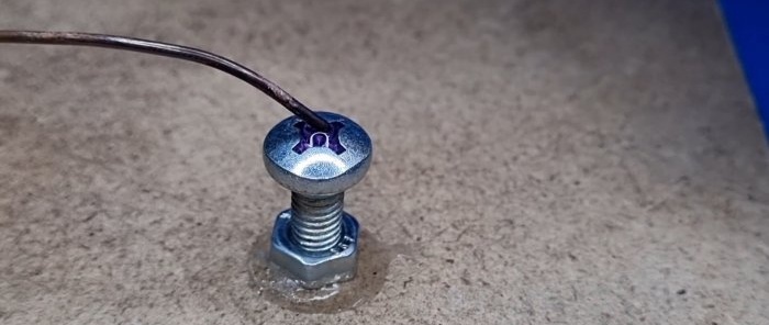 How to make a photoresistor from a screw and a piece of wire