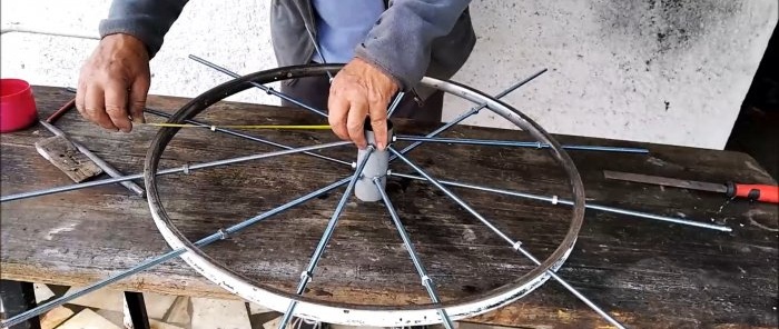 Low-speed impeller from a bicycle rim for a wind pump or wind generator