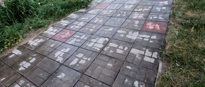 How to quickly get rid of grass at the joints of slabs on paths