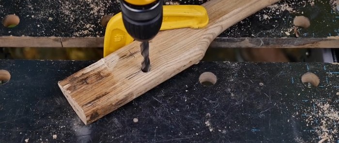 How to securely place an ax on an ax handle without wedges American system