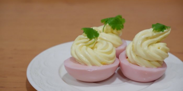 Pink deviled eggs